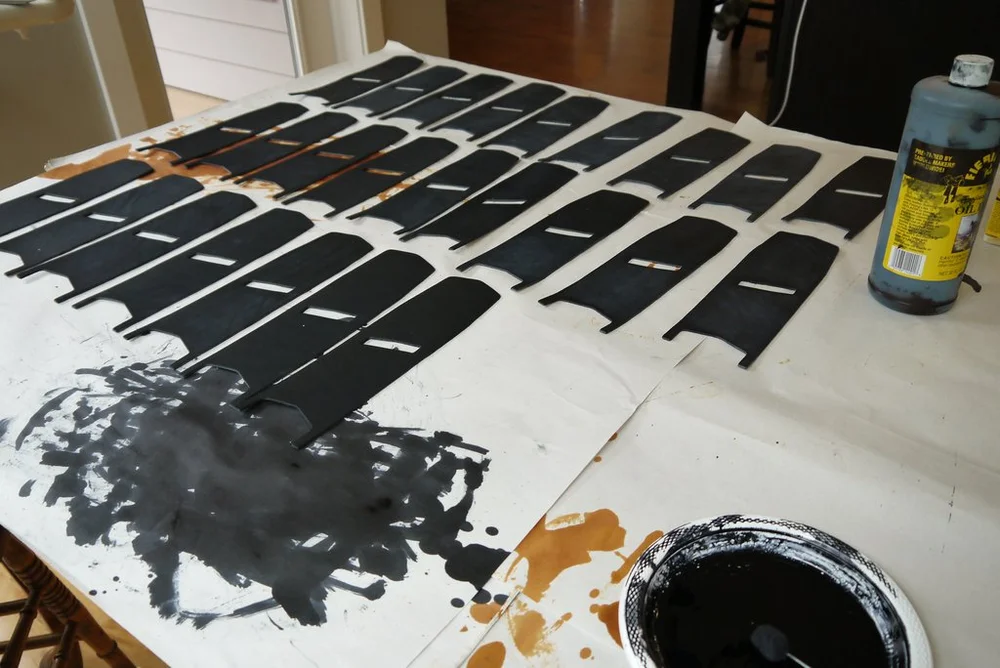 Black dye on cut panels