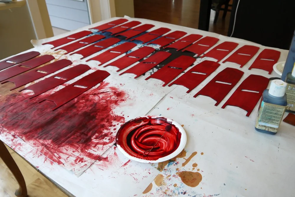 Red dye on cut panels